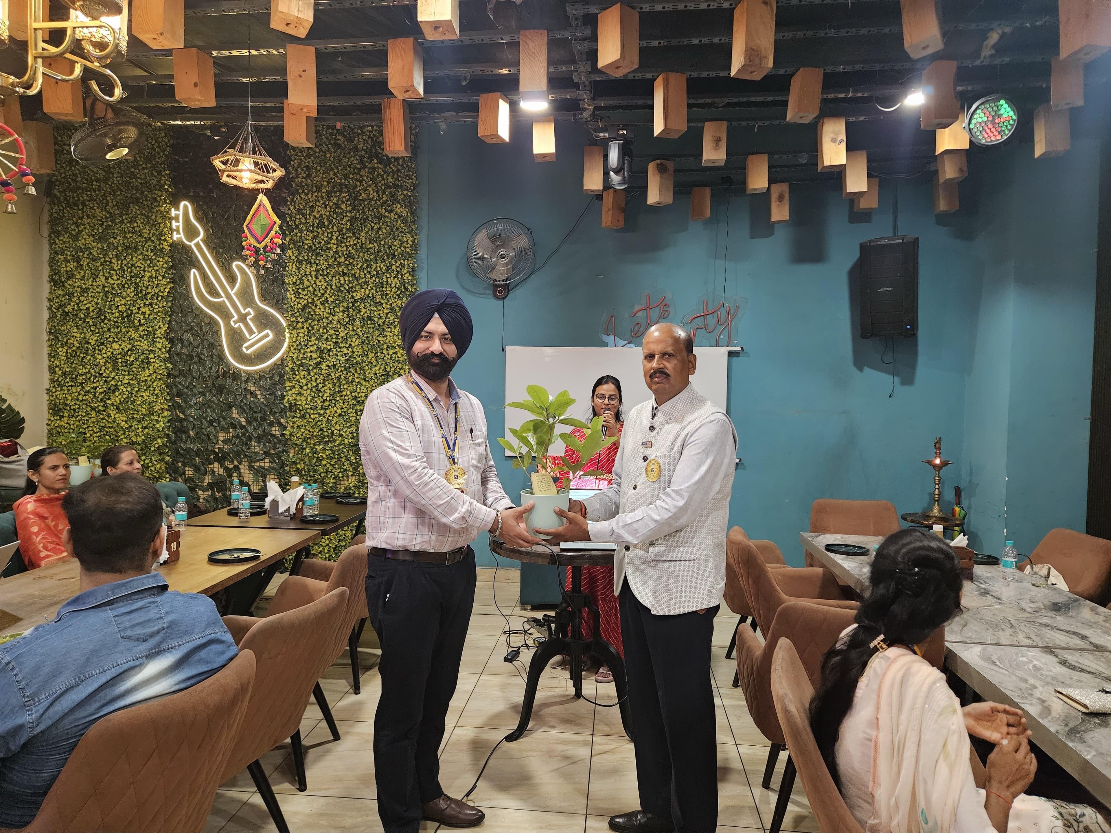 A professional recognition moment at an event